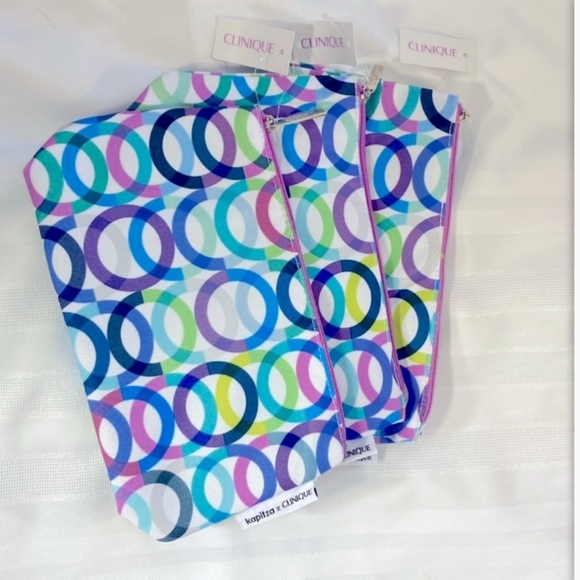 CLINIQUE Cosmetic Bag Rings of Unity Mod 70's Print NEW - Picture 3 of 5